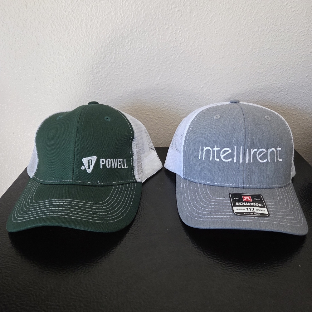 Two Green and Gray Caps